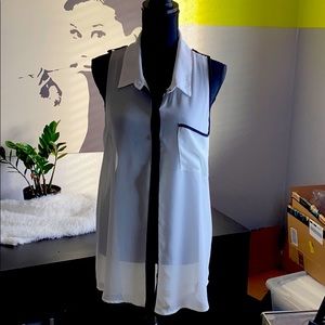 White trimmed in black Top